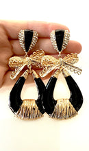 Load image into Gallery viewer, Black and Gold Enamel Bow Earrings
