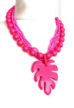 Load image into Gallery viewer, Pink Monstera Leaf Necklace
