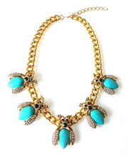 Load image into Gallery viewer, Turquoise and Gold Insect Necklace

