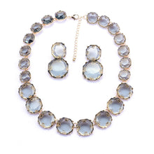 Load image into Gallery viewer, Grey Transparent Jewelled Statement Necklace and Earrings Set
